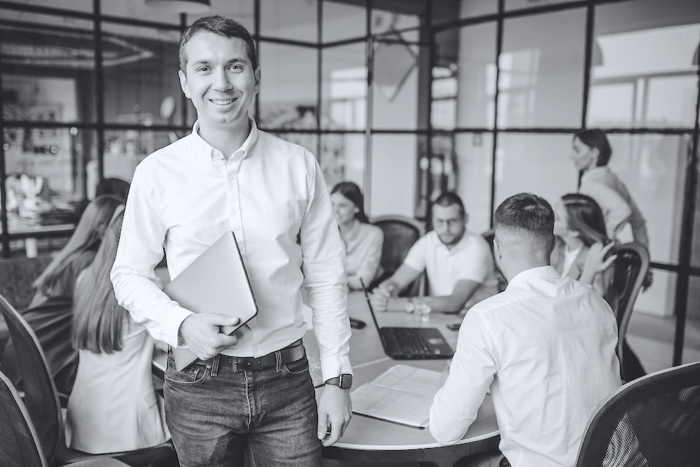 Group of people working out business plan in an office