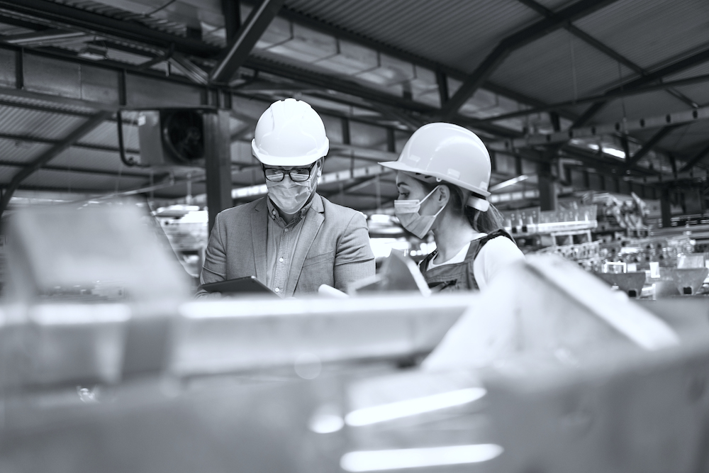 Working people with protection mask during corona virus pandemic.