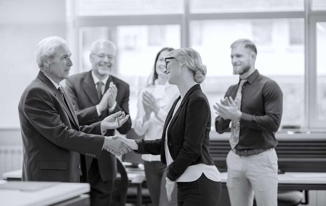 business-people-shaking-hands-after-successful-negotiations-in-the-office