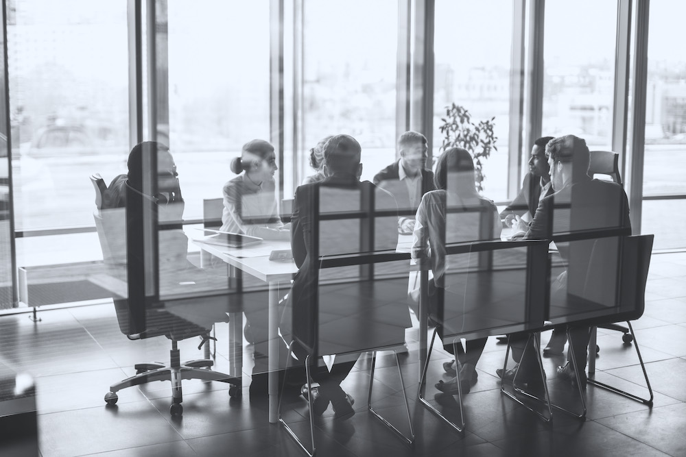 business team and manager in a meeting