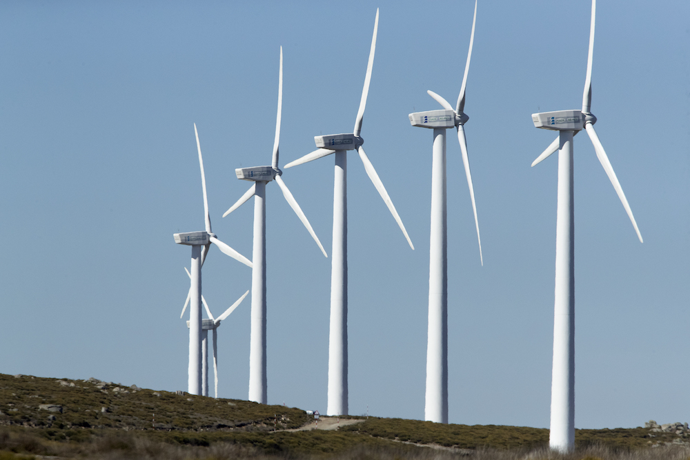 wind-turbines-on-mountainous-divide-producing-electricity-by-the-force-of-the-wind